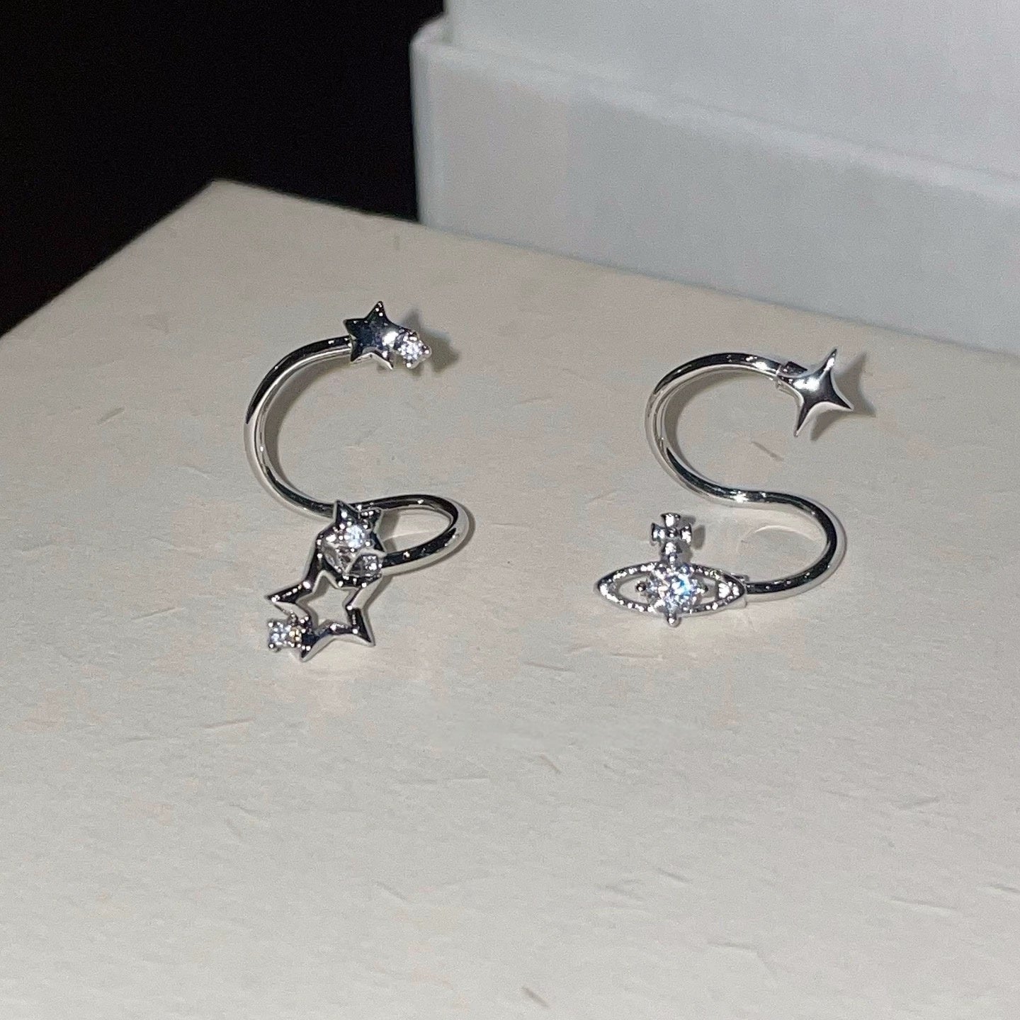 Swirling Star Conch Earrings