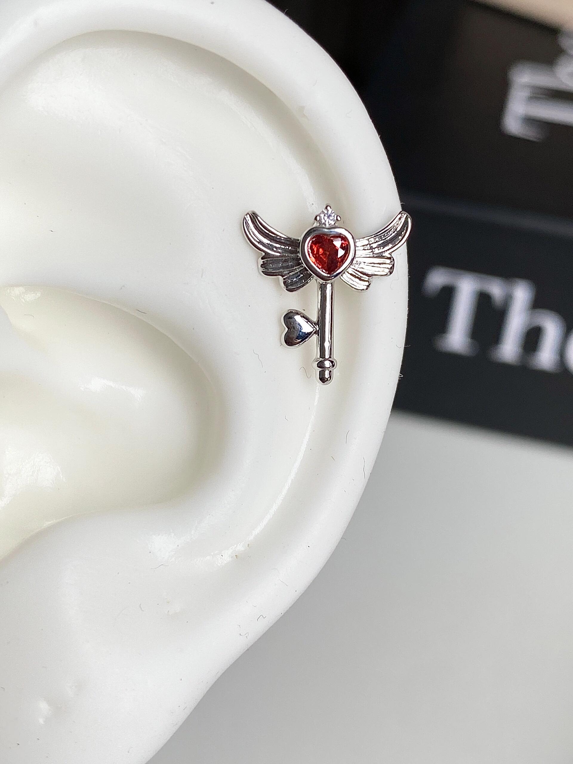 Winged Key Helix Earrings