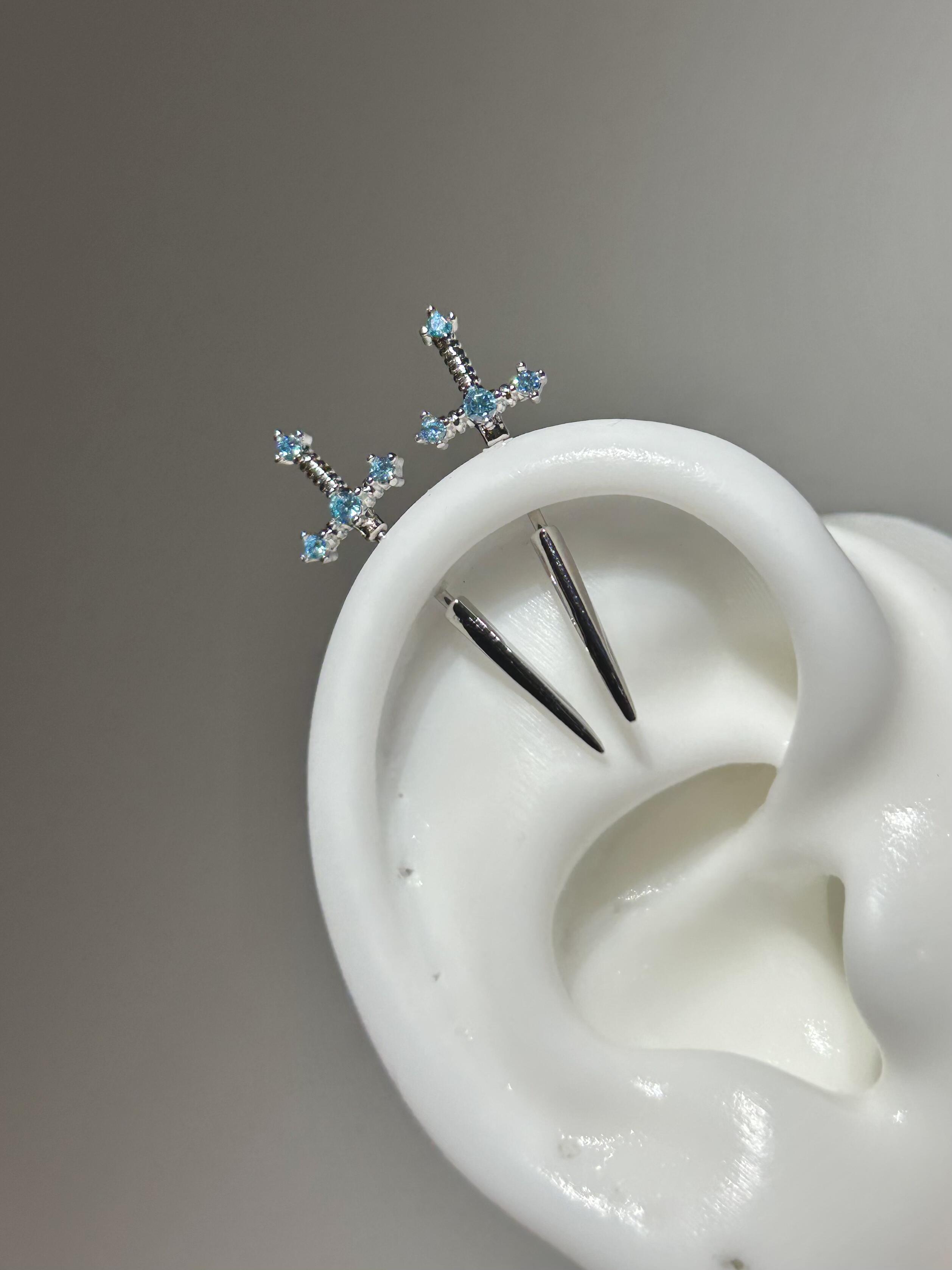 Blue Crystal sword vertical helix earrings
