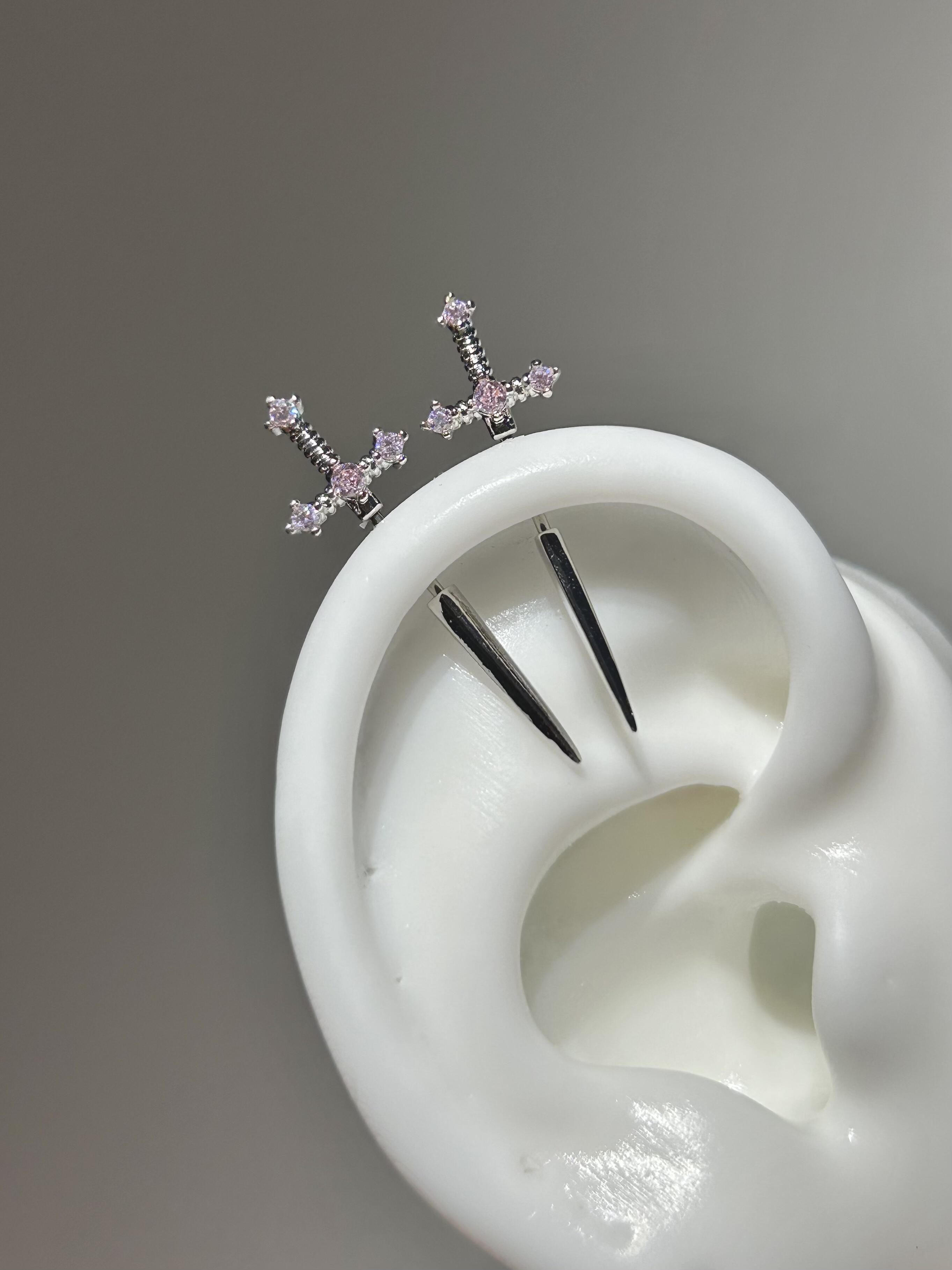 Pink sword vertical helix earrings