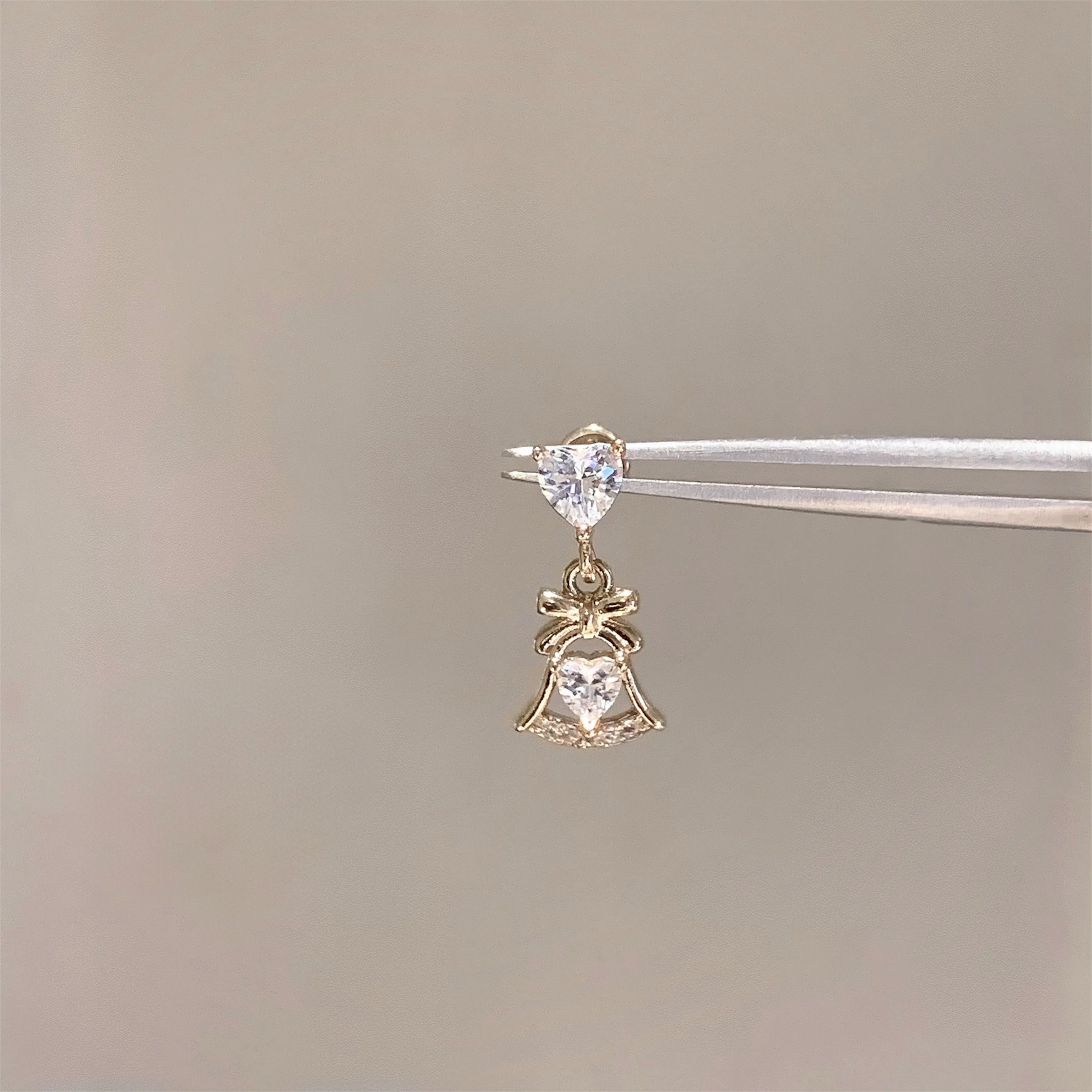 Gold Dainty Bow Helix Stud