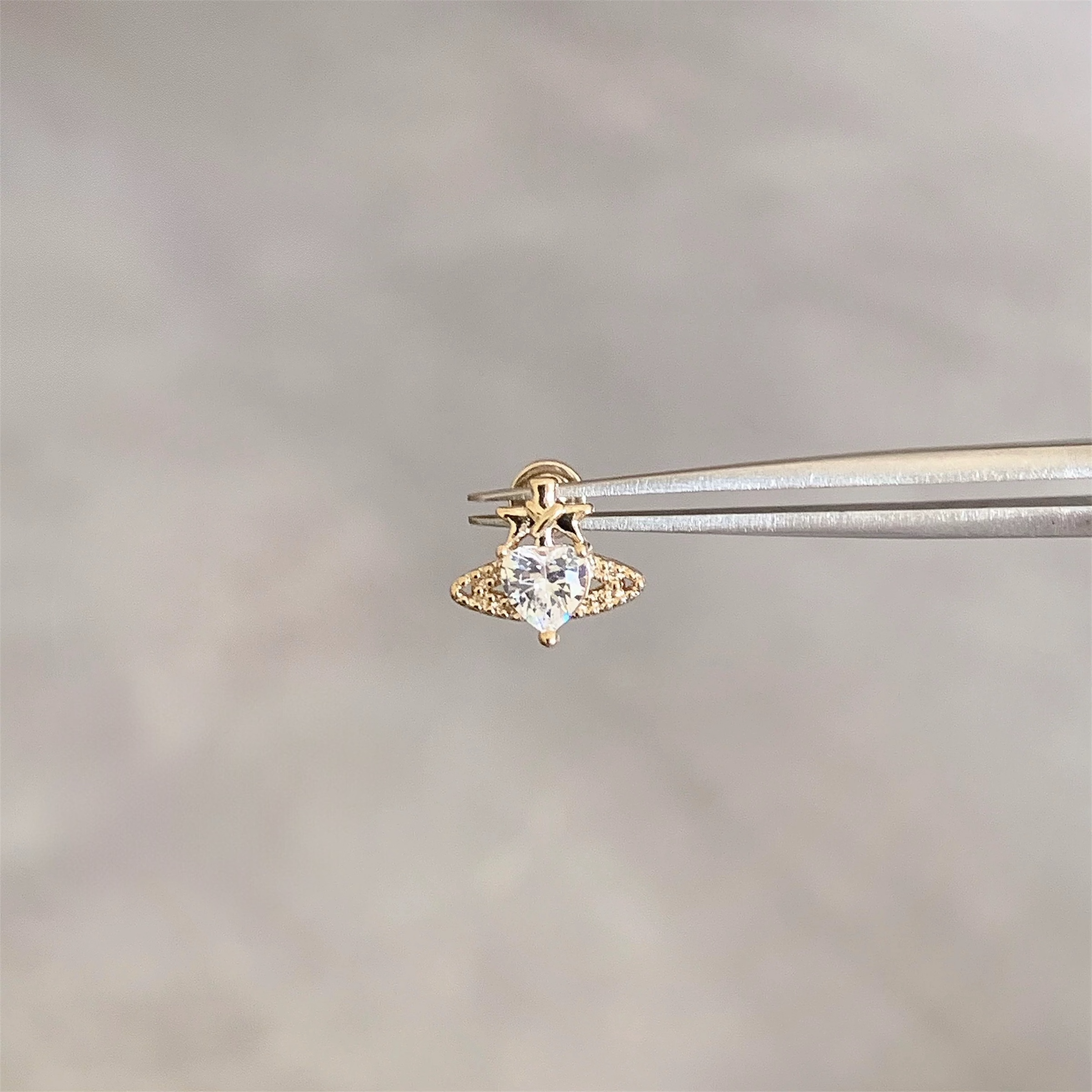 Gold Heart Planet Helix Stud